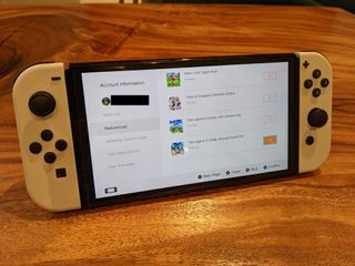 eShop'taki hesap profilinizden oyunlarınızı nasıl yeniden indireceğinize dair ekran görüntüsünü gösteren masayı açın.