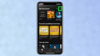Ayar dişlisi vurgulanmış olarak Spotify uygulamasını gösteren bir iPhone ekran görüntüsü
