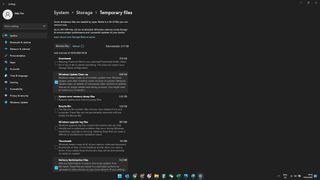 "Windows Update Temizleme" ve "Teslimat iyileştirme dosyaları"nın vurgulandığı Windows 11 Geçici dosyalar menüsünün ekran görüntüsü